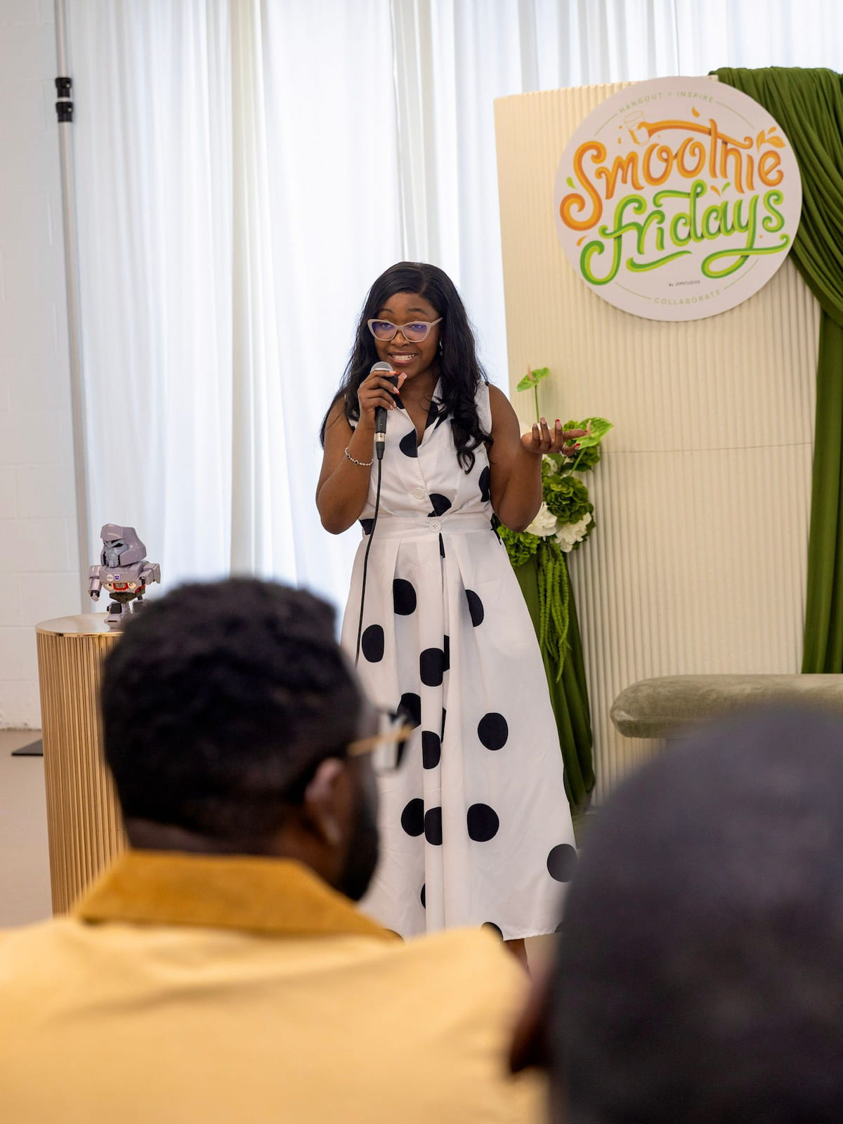 Oyin speaking to an audience
